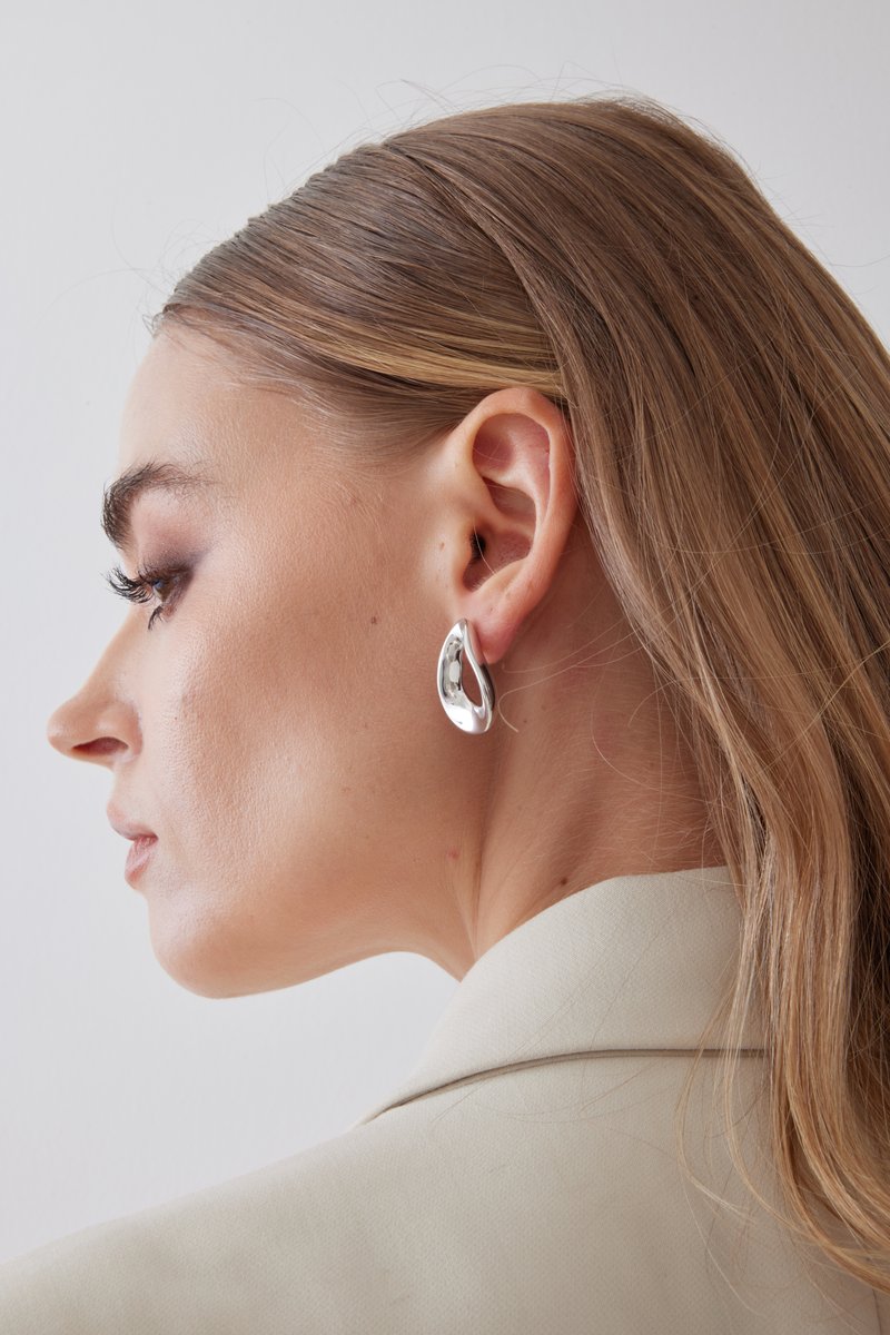 Model wearing Univox jewelry