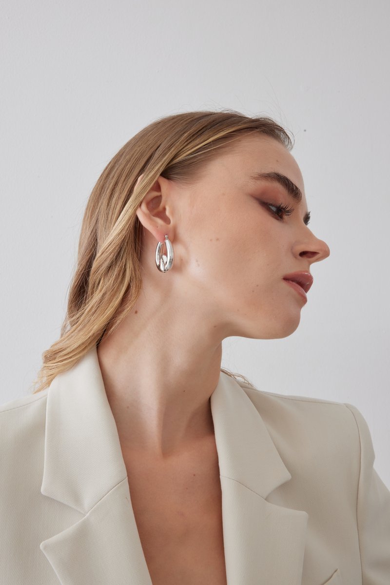 Model wearing Univox jewelry