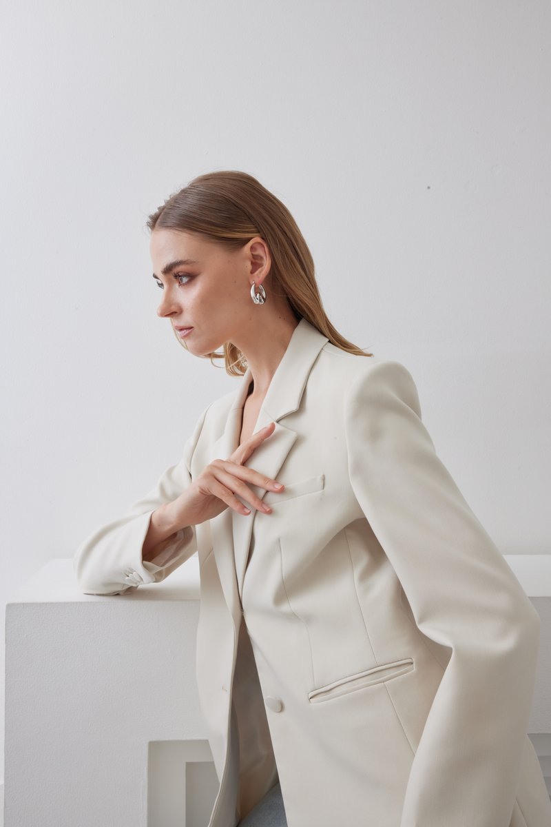 Model wearing Univox jewelry